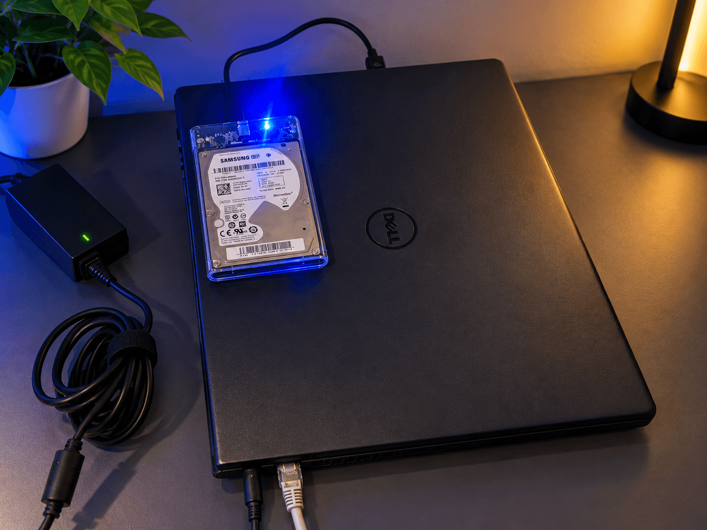 The Dell Inspiron running the HomeLab, external HDD enclosure on top